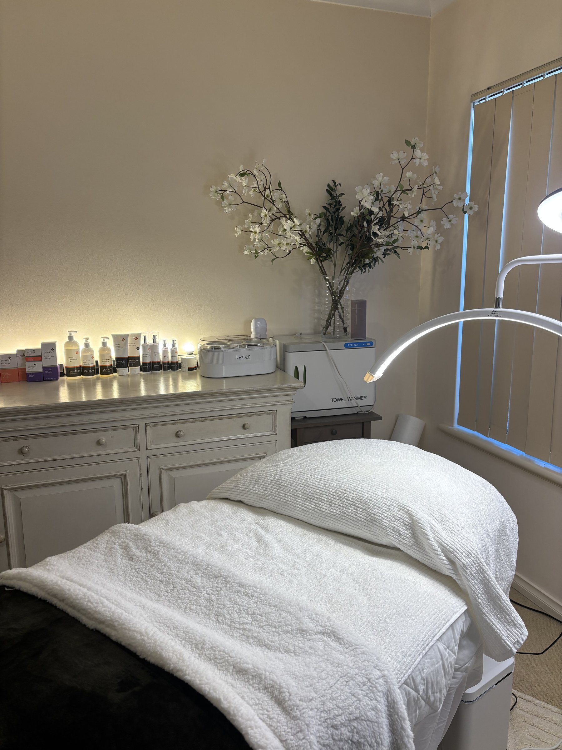 Skin Glow By Maryam treatment room with Environ professional skincare products